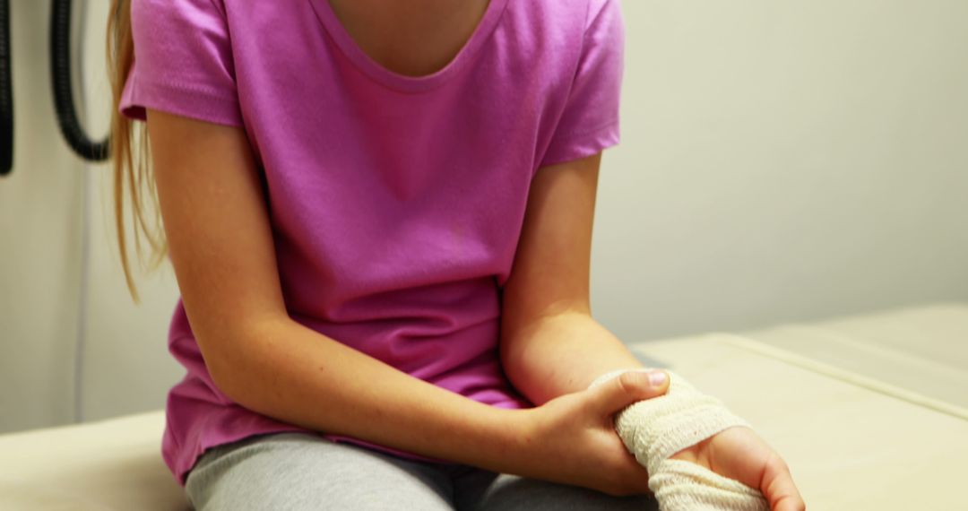 Young Girl with Injured Arm Wearing Purple Shirt - Free Images, Stock Photos and Pictures on Pikwizard.com