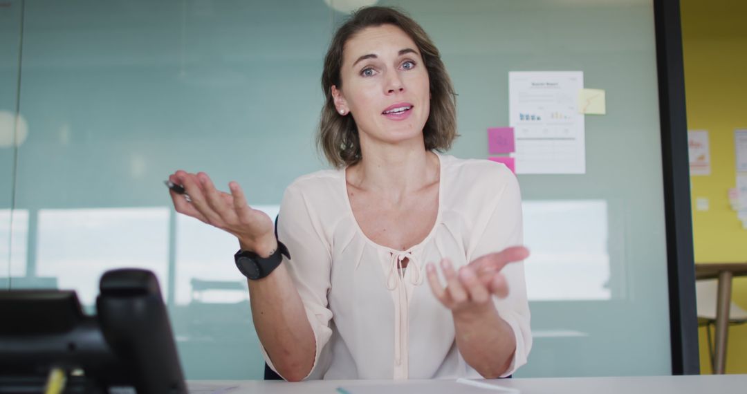 Confused Business Woman Discussing Ideas in Office Meeting - Free Images, Stock Photos and Pictures on Pikwizard.com