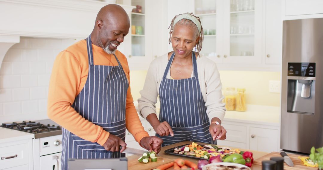 Senior African American Couple Preparing Healthy Meal in Modern Kitchen - Free Images, Stock Photos and Pictures on Pikwizard.com