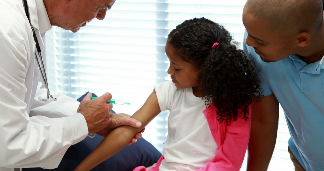 Child Receiving Vaccination From Doctor with Parent Comforting - Free Images, Stock Photos and Pictures on Pikwizard.com