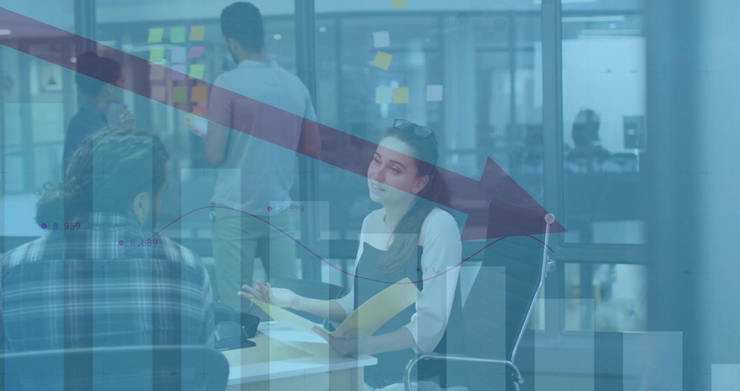 Business Team Analyzing Decline in Office with Graph Overlay