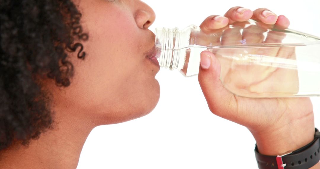 Close-up of Person Drinking Water from Bottle - Free Images, Stock Photos and Pictures on Pikwizard.com