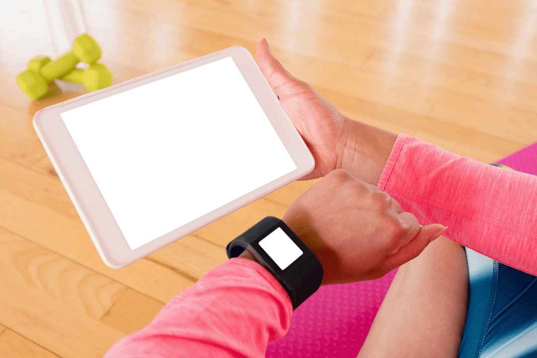 Fitness Enthusiast with Transparent Tablet Screen and Smartwatch
