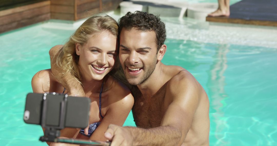 Happy Couple Taking Selfie by the Pool - Free Images, Stock Photos and Pictures on Pikwizard.com