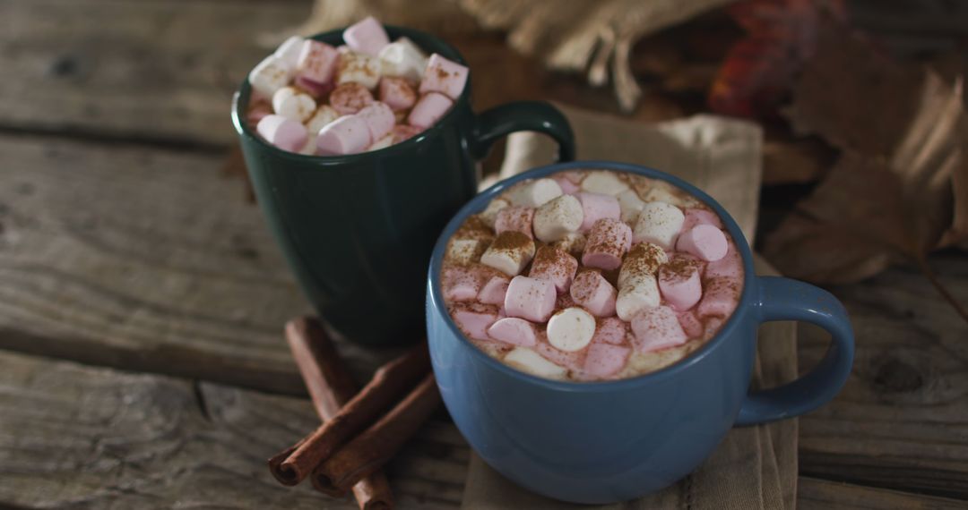 Hot Cocoa with Mini Marshmallows and Cinnamon Sticks on Rustic Wood Table - Free Images, Stock Photos and Pictures on Pikwizard.com