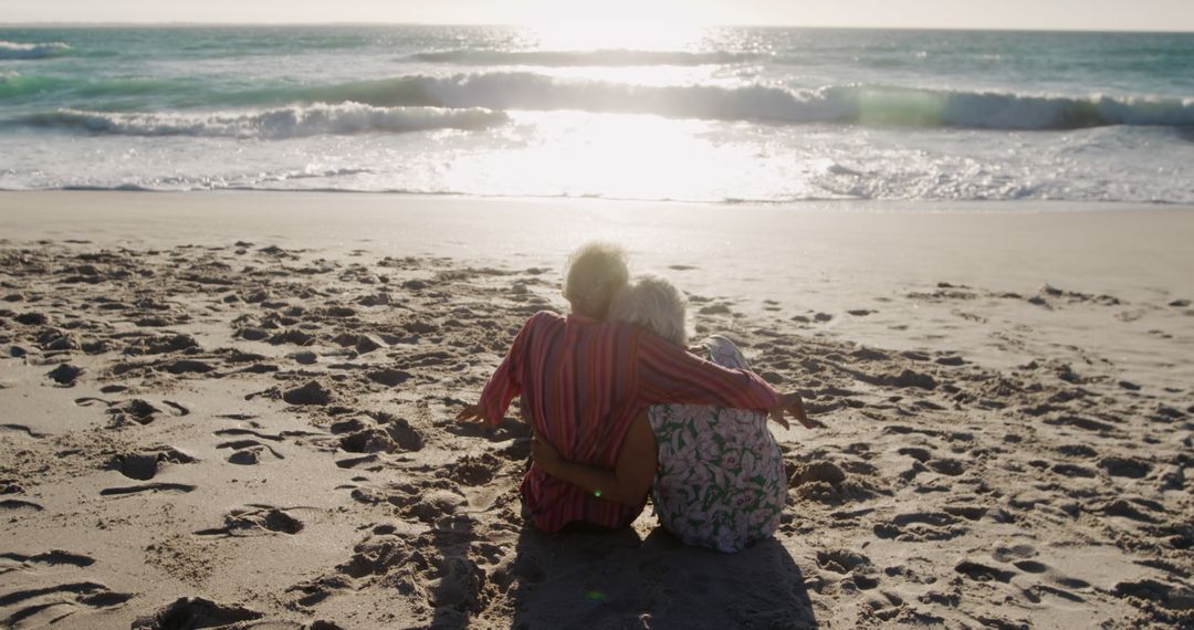 Senior Couple Embracing on Seaside during Sunset - Free Images, Stock Photos and Pictures on Pikwizard.com