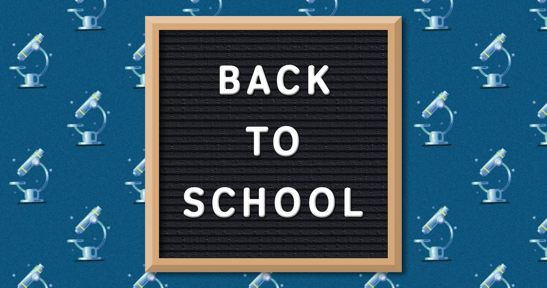 Back to School Message on Blackboard With Microscope Pattern