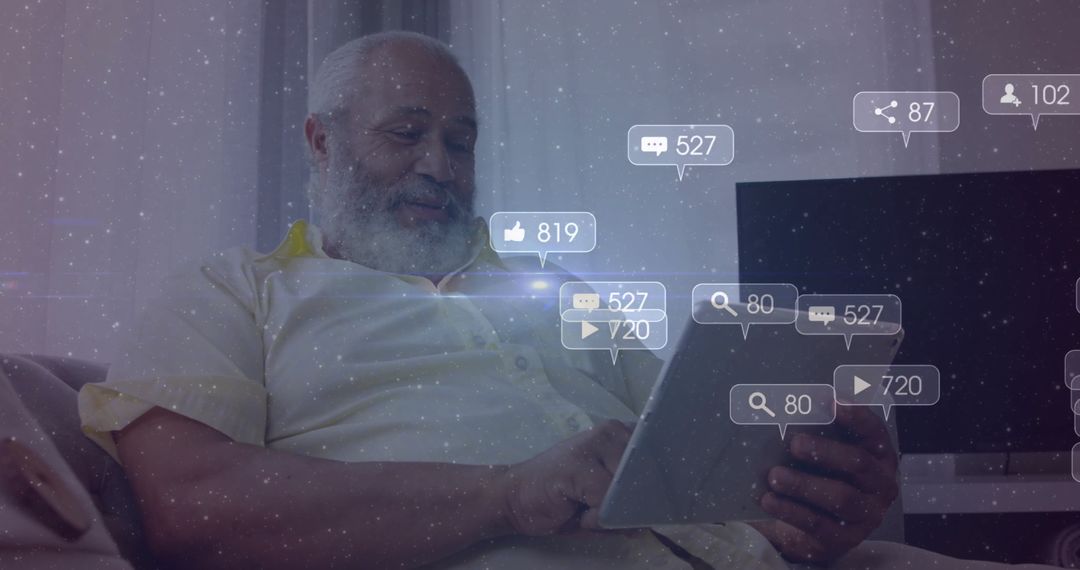 Senior Man Engaging with Technology Relaxing at Home
