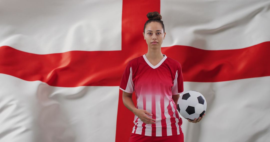 Female Soccer Player Holding Ball With England Flag in Background - Free Images, Stock Photos and Pictures on Pikwizard.com