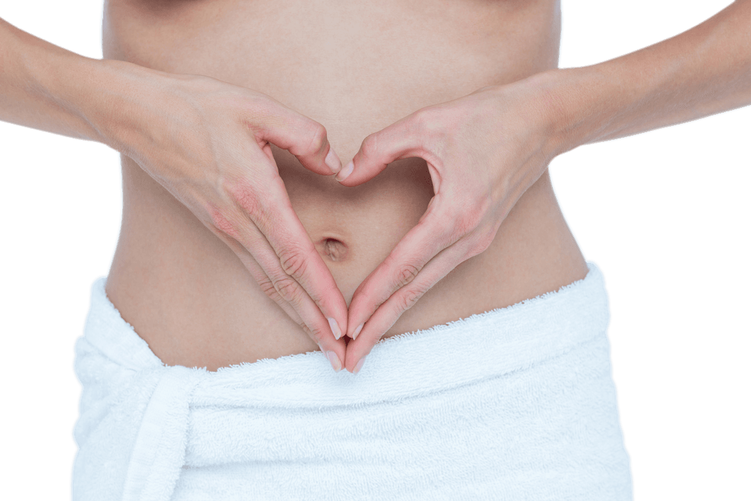 Woman's Hands Forming Heart Shape on Bare Belly Transparent Background