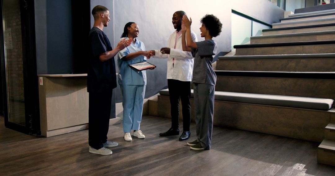 Healthcare Team Celebrating with Certificate Ceremony