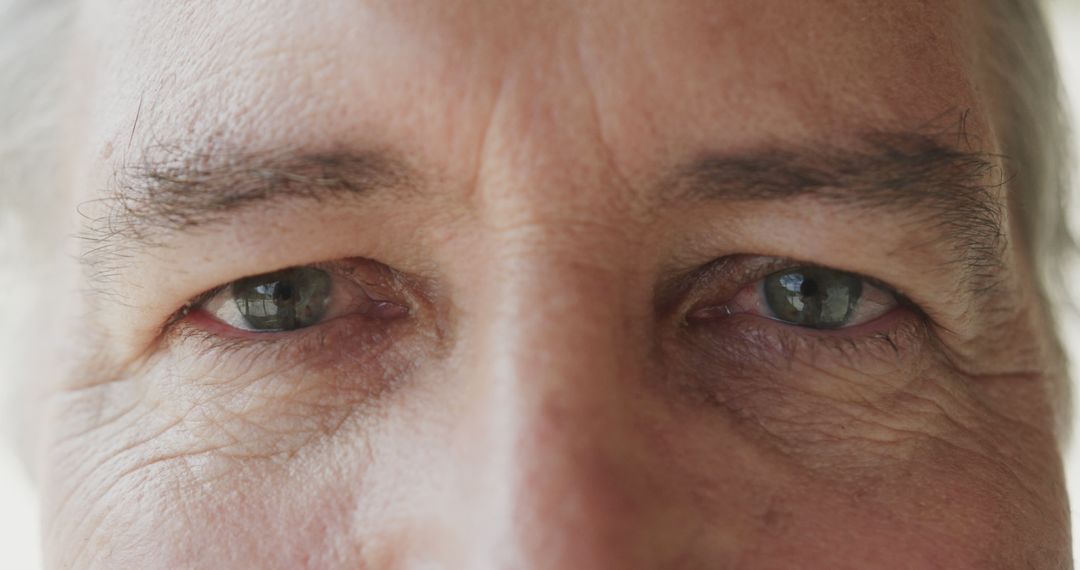 Close-up of Elderly Man's Eyes Reflecting Emotion - Free Images, Stock Photos and Pictures on Pikwizard.com