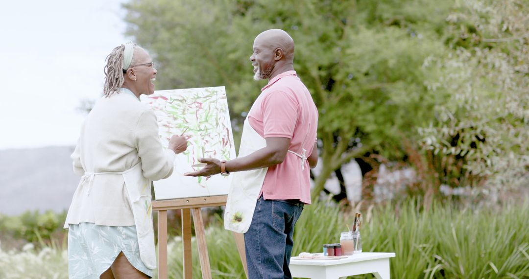 Senior African American Couple Painting Outdoors Enjoying Hobby - Free Images, Stock Photos and Pictures on Pikwizard.com