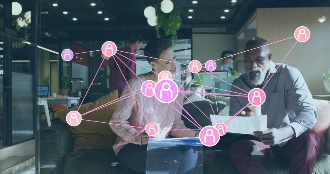 Collaborating in Modern Office Lounge with Digital Network Overlay