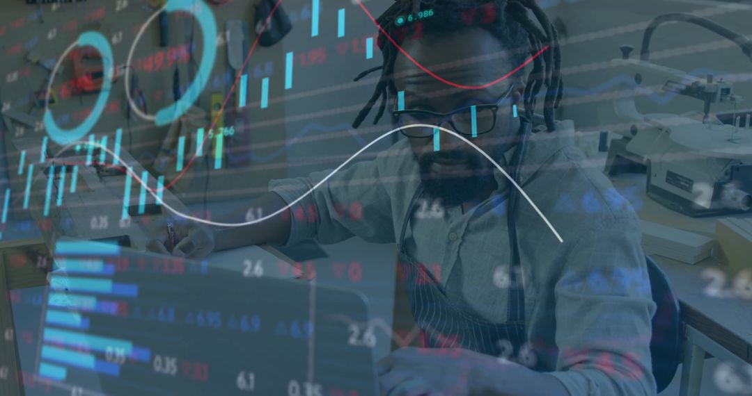 Financial Analysis Charts Over Professional Working on Laptop