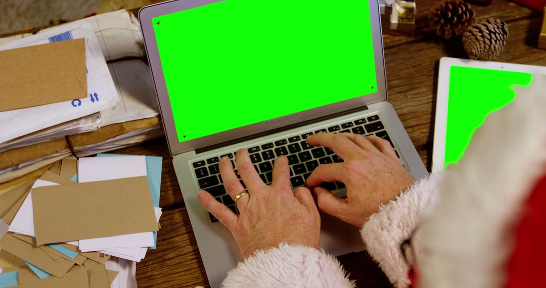 Santa Claus Typing on Laptop with Green Screen - Free Images, Stock Photos and Pictures on Pikwizard.com