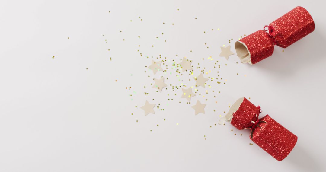 Festive Red Christmas Cracker with Gold Stars on White Background