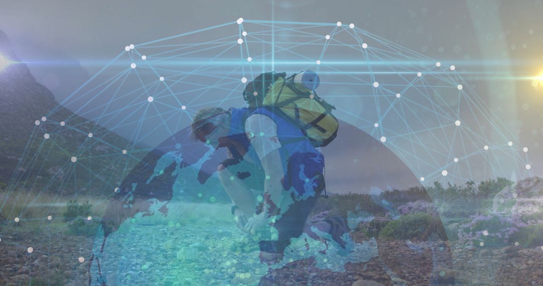 Hiker with Digital Network Icons in Mountain Wilderness