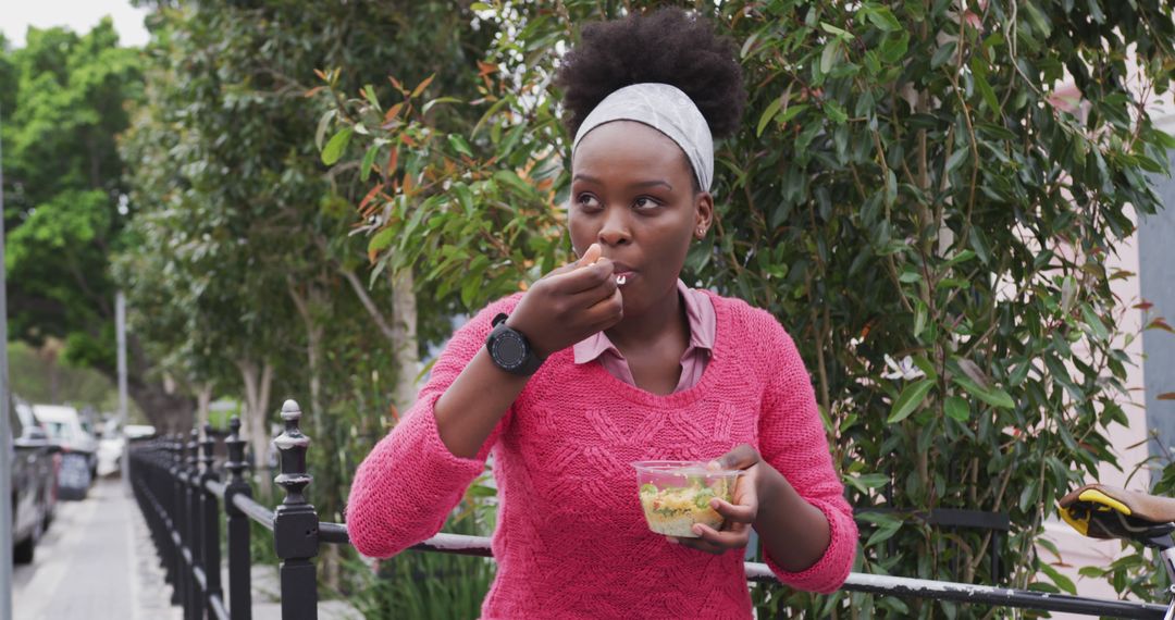 Young Woman Enjoying Healthy Salad Outdoors - Free Images, Stock Photos and Pictures on Pikwizard.com