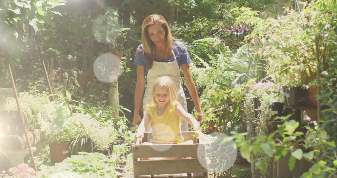 Mother and Daughter Enjoying a Sunny Day in Lush Garden