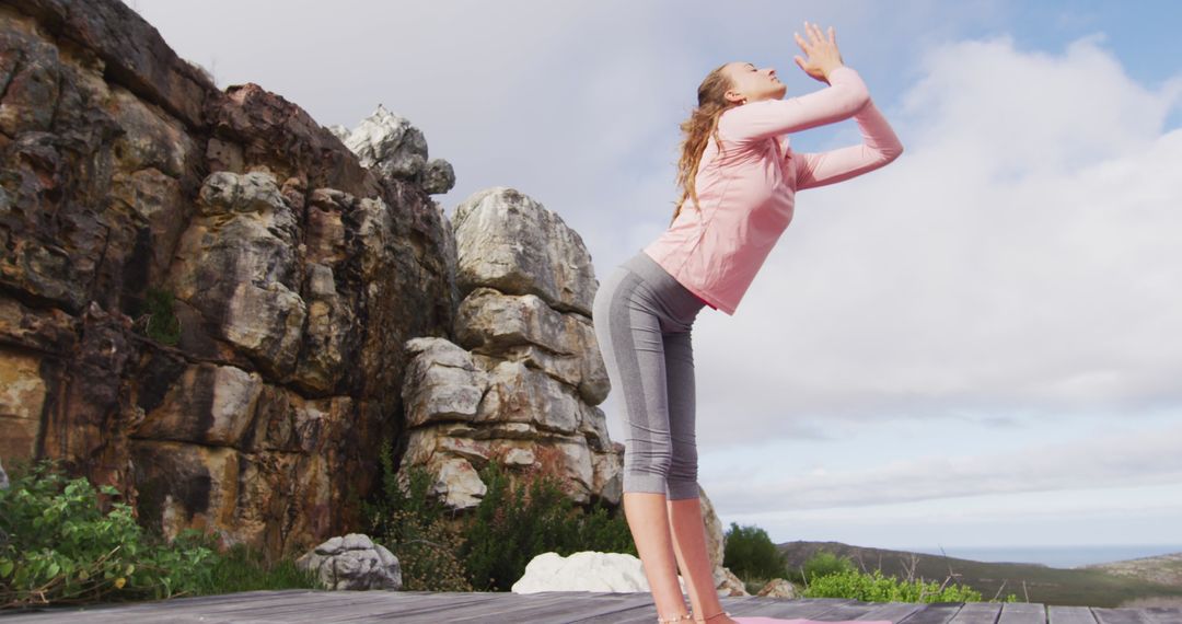 Woman Practicing Yoga Stretch Tropical Mountainside Outdoor - Free Images, Stock Photos and Pictures on Pikwizard.com