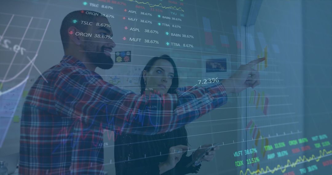 Business Professionals Analyzing Data with Transparent Screen Interface