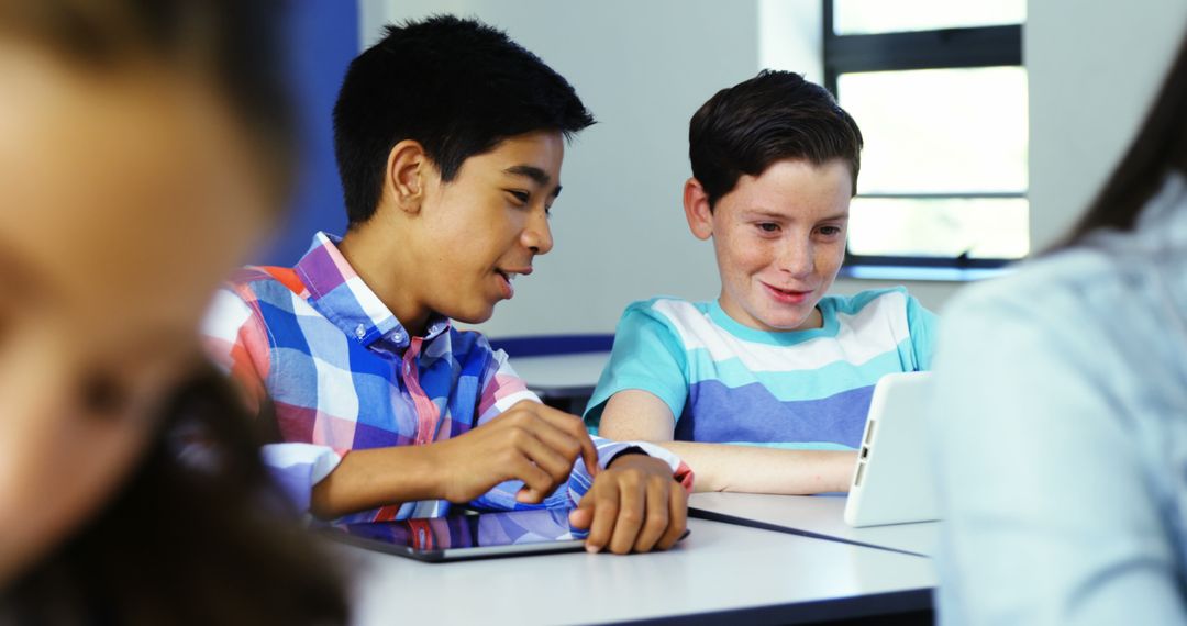 Diverse Boys Using Tablet in Classroom - Free Images, Stock Photos and Pictures on Pikwizard.com