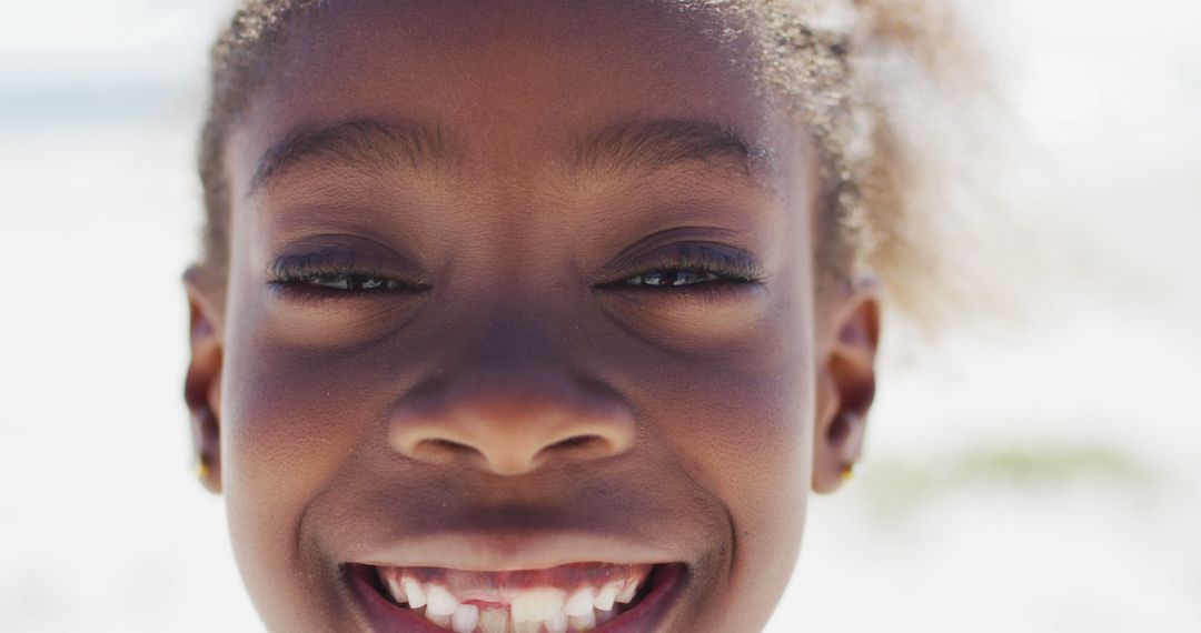 Close-up Portrait of Joyful Smiling Girl Outdoors - Free Images, Stock Photos and Pictures on Pikwizard.com