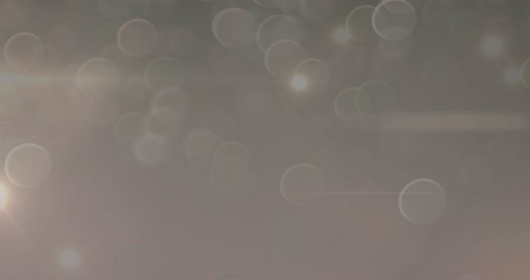 Soft Light Circles on Grey Abstract Background