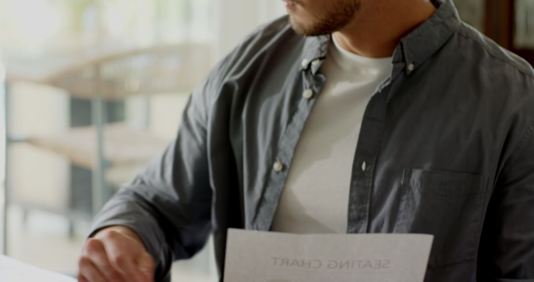 Man Engaged in Creative Writing at Home Office