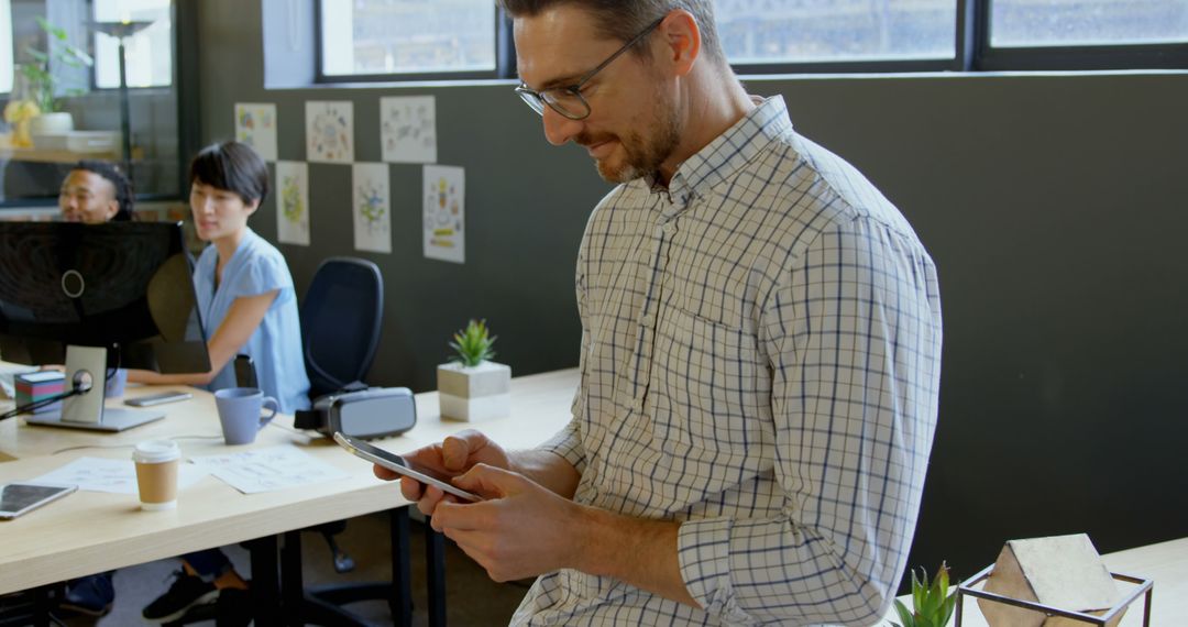 Professional Executive Engaged with Smartphone in Modern Office