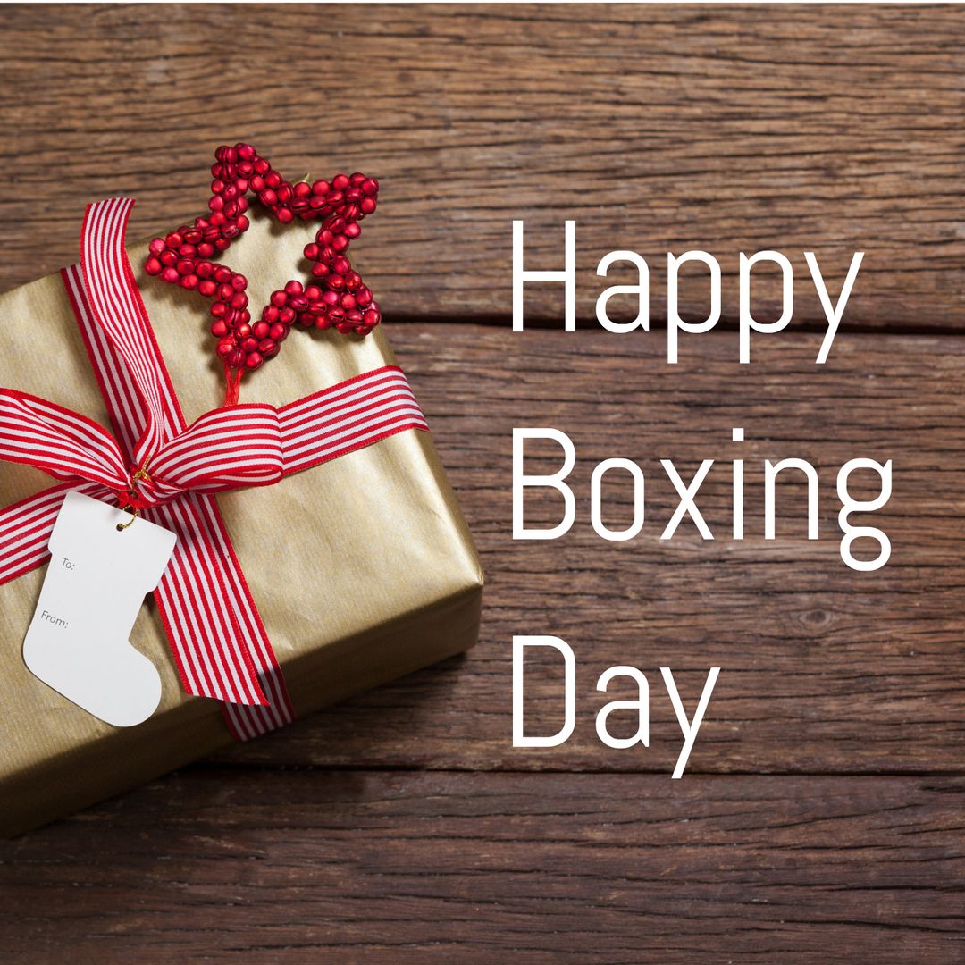 Festive Boxing Day Gift with Red Ribbon and Star Decorations