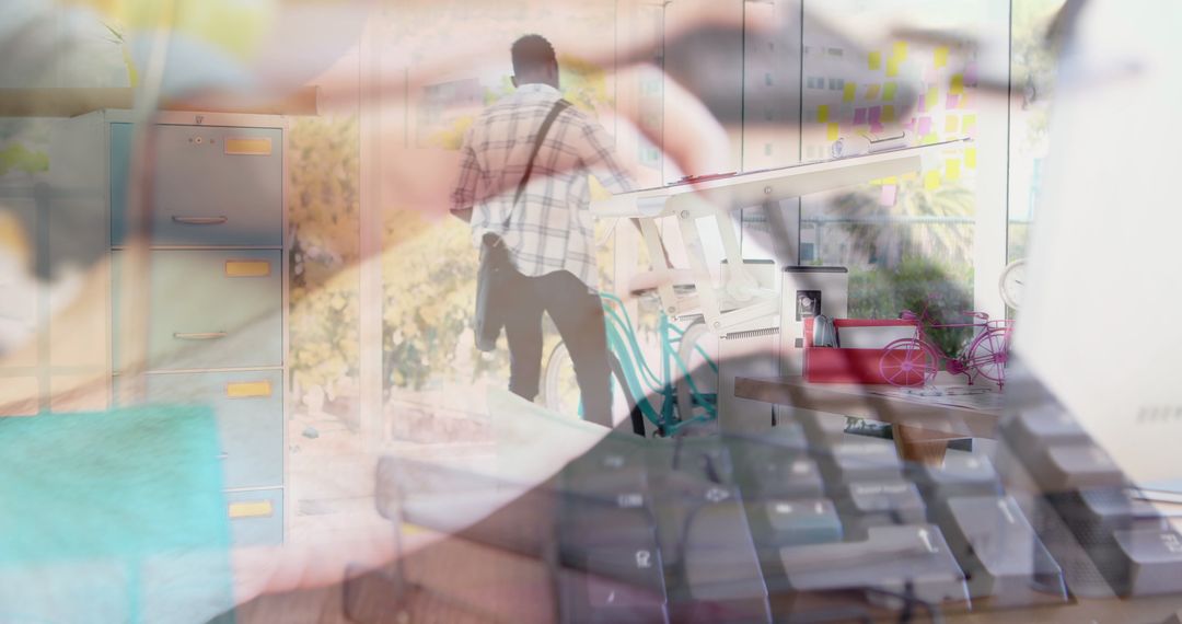 Businessman with Bicycle Overlaid with Keyboard Use