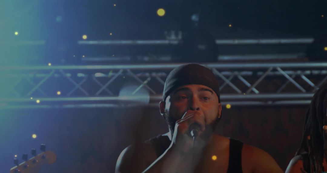 Energetic Vocalist Performing Under Stage Lights