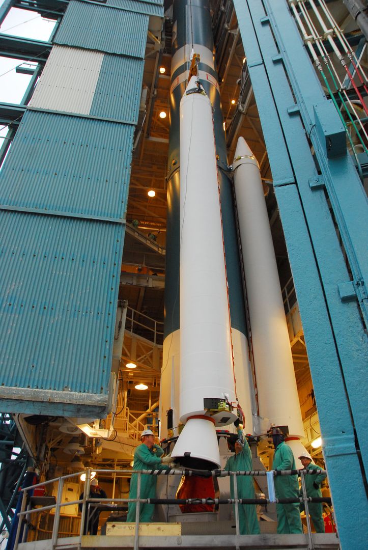 Technicians Preparing Delta II Rocket for National Polar-Orbiting Satellite Launch - Free Images, Stock Photos and Pictures on Pikwizard.com