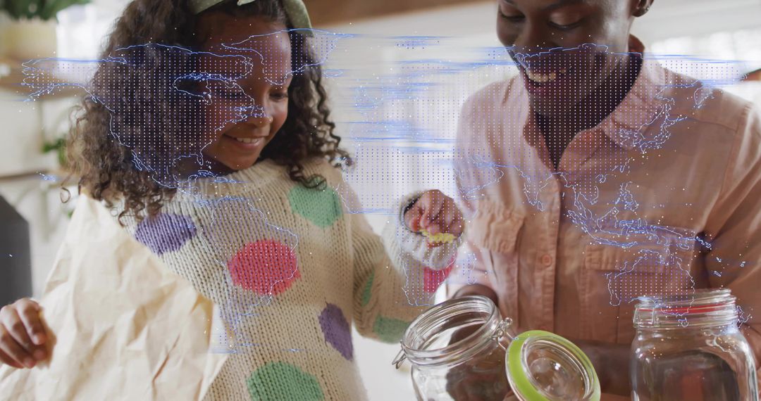 Mother and daughter saving coins in glass jars with world map overlay, building money habits