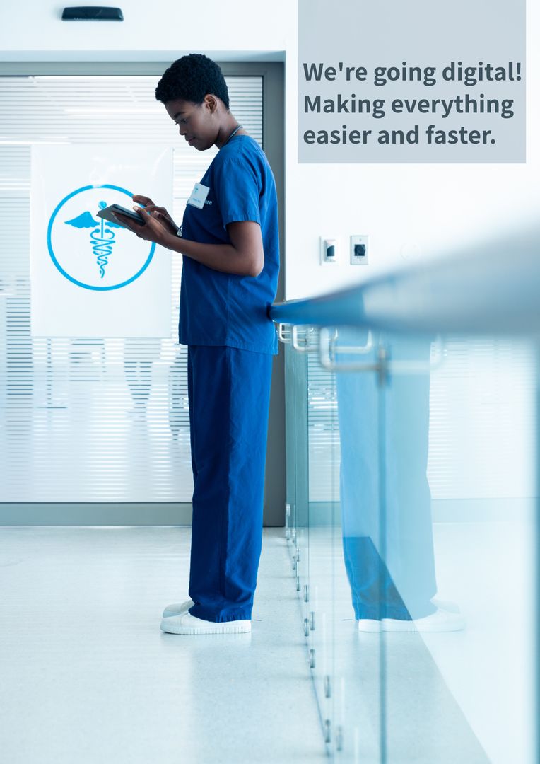 Healthcare Professional Using Tablet in Modern Hospital Setting