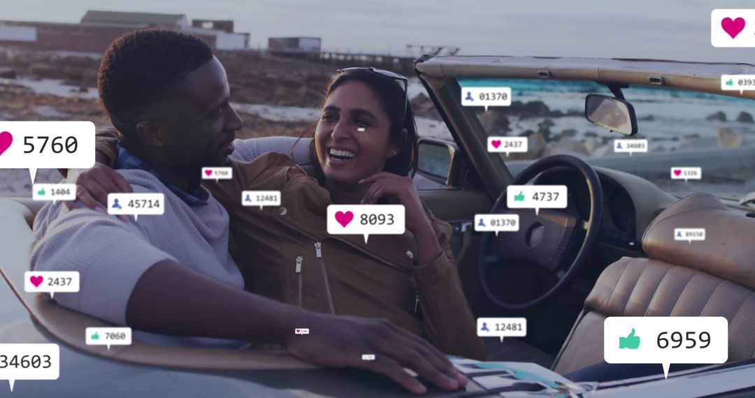 Couple Enjoying Scenic Coastal Drive in Convertible with Social Media Interaction