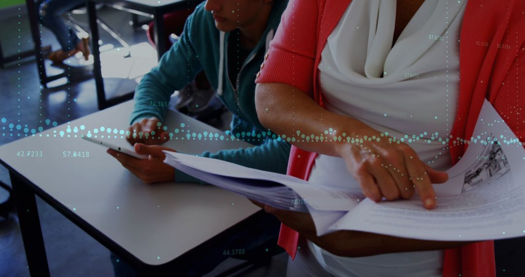 Teacher Engaging with Students in Modern Classroom Environment