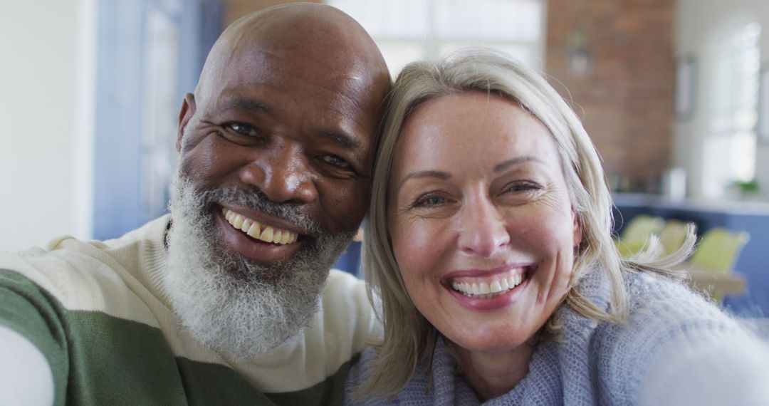 Smiling Senior Couple Taking Selfie at Home - Free Images, Stock Photos and Pictures on Pikwizard.com