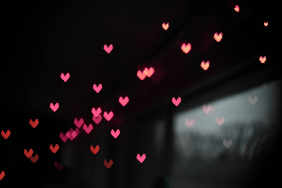 Romantic Heart-shaped Bokeh with Pink and Red Lights