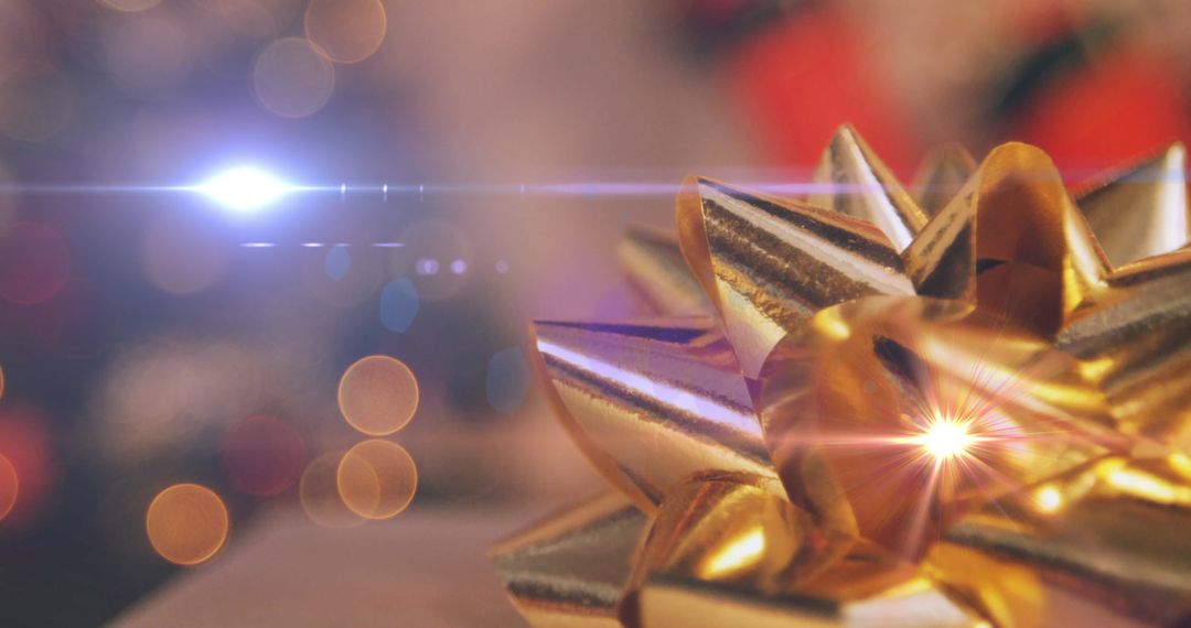 Glowing Gold Christmas Bow with Festive Fairy Lights