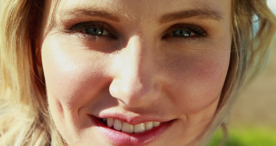 Close-Up Portrait of Smiling Woman with Natural Light - Free Images, Stock Photos and Pictures on Pikwizard.com