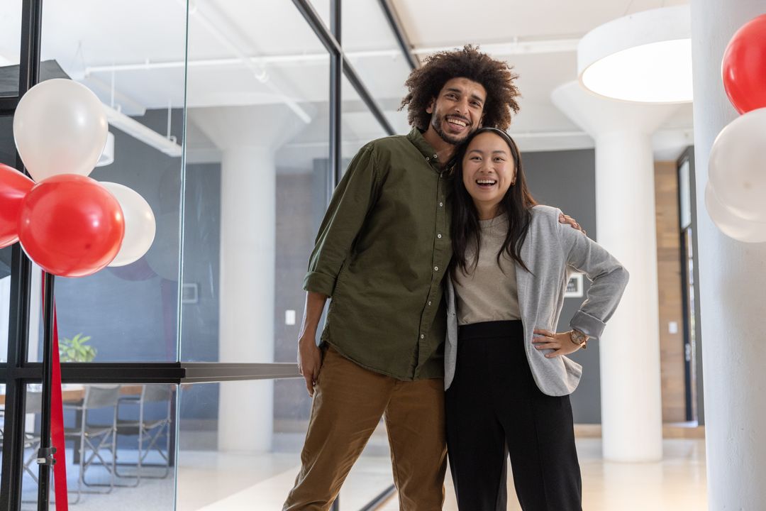 Diverse Coworkers Celebrating in Modern Office Setting