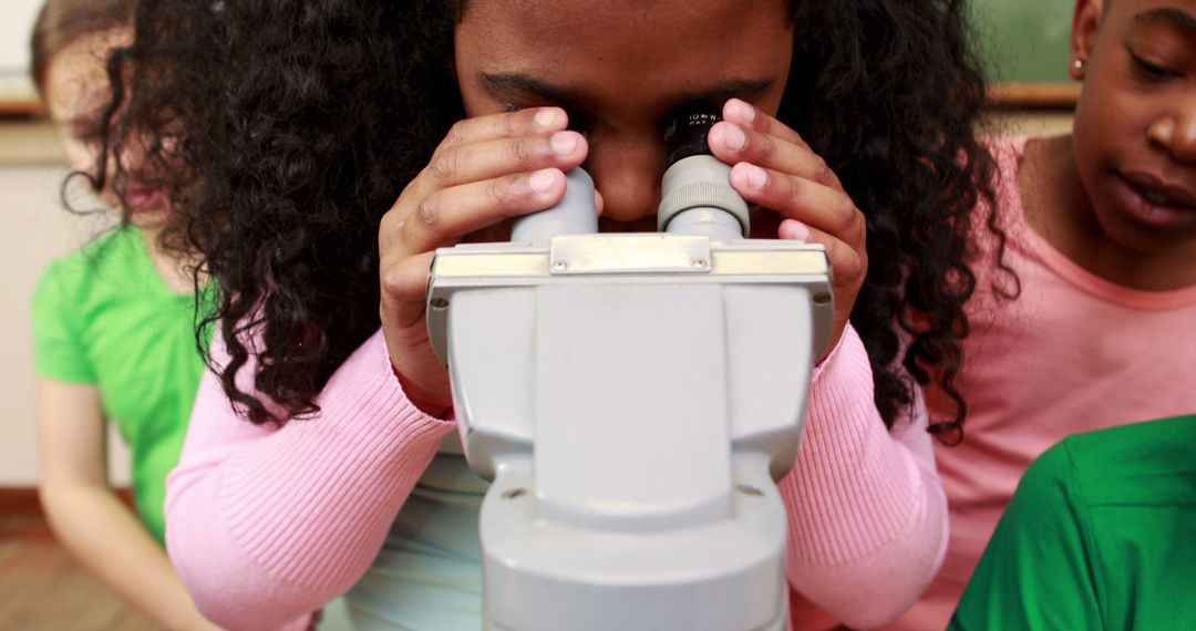 A young African American girl is using an asthma inhaler for respiratory relief, with copy space - Free Images, Stock Photos and Pictures on Pikwizard.com