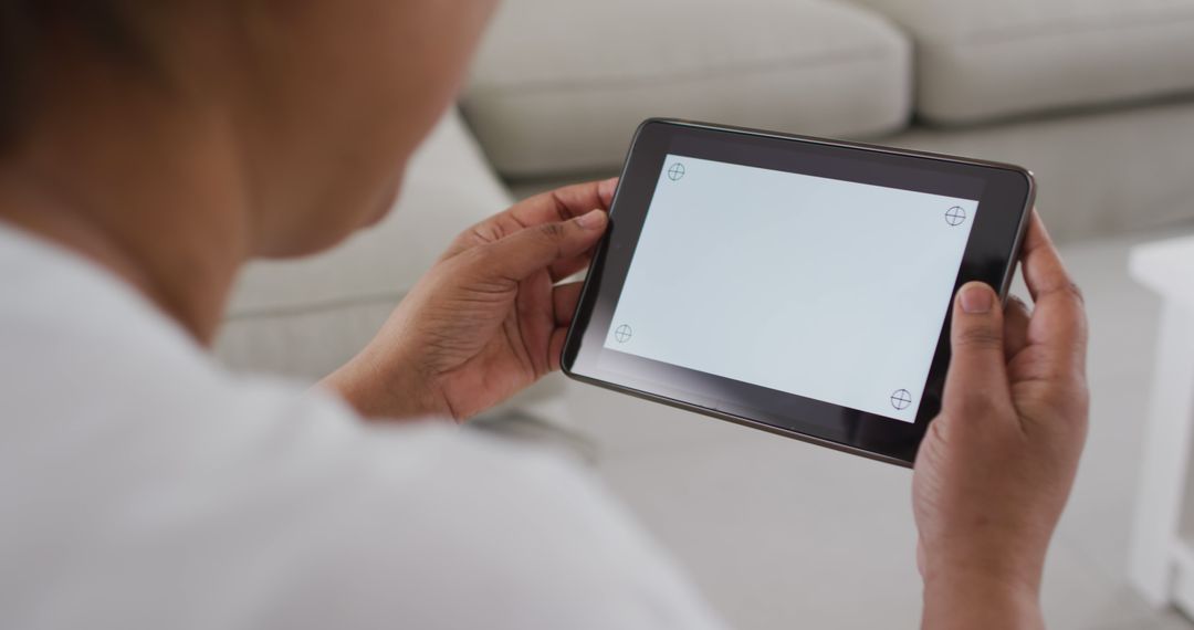 Person Using Digital Tablet with Blank Screen - Free Images, Stock Photos and Pictures on Pikwizard.com