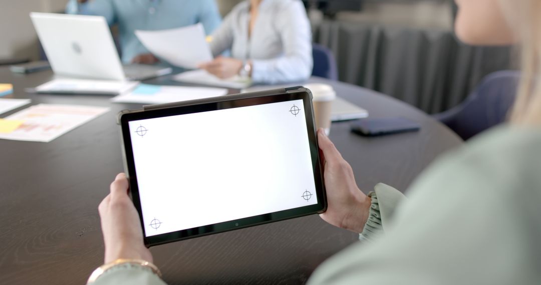 Business Team Having Meeting, Woman Holding Tablet with Blank Screen - Free Images, Stock Photos and Pictures on Pikwizard.com