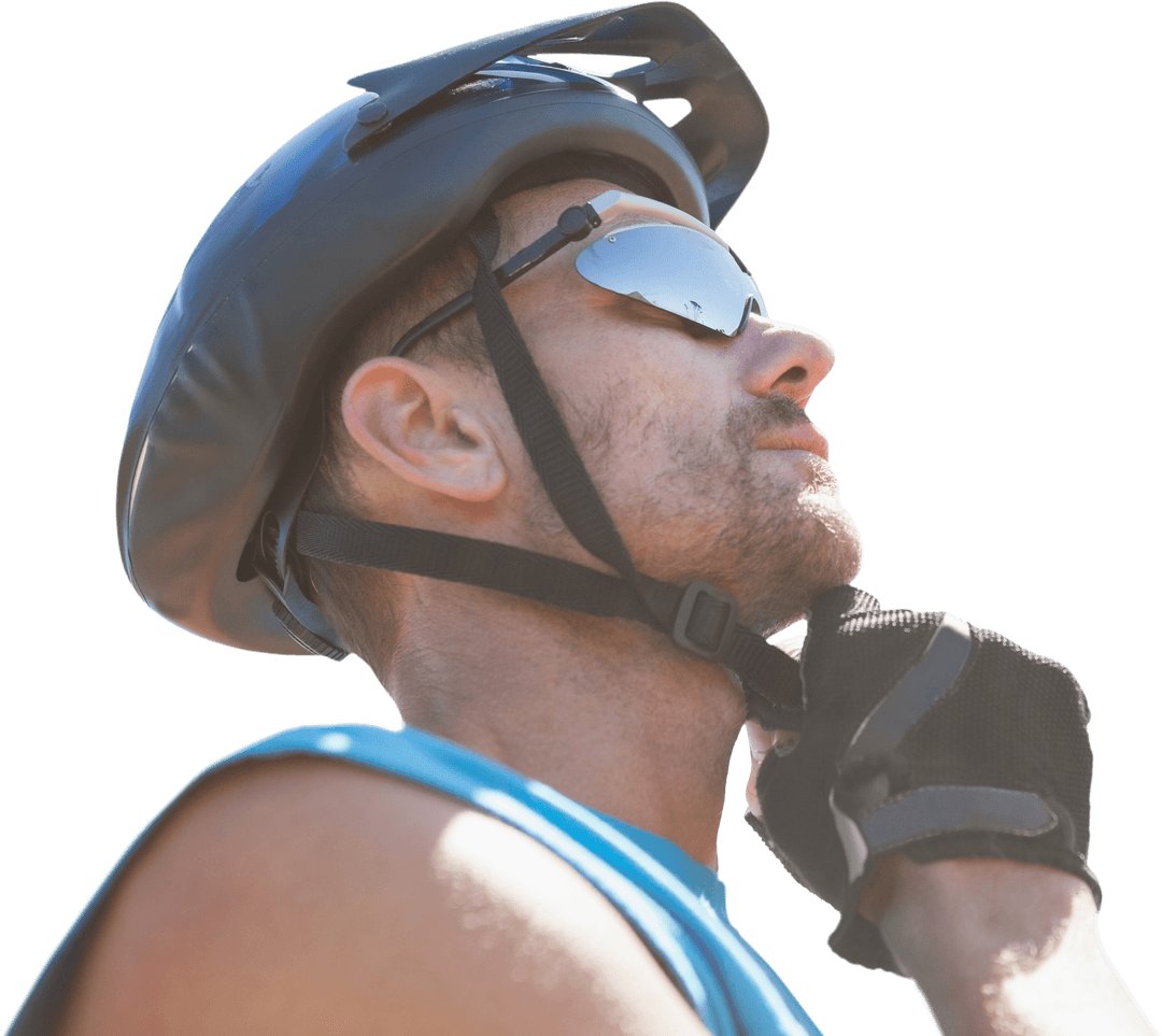 Cyclist Fastening Helmet on Transparent Background for Sport Concepts