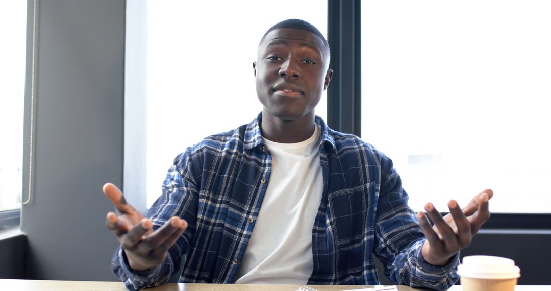 Confident Businessman Engaging in Online Meeting