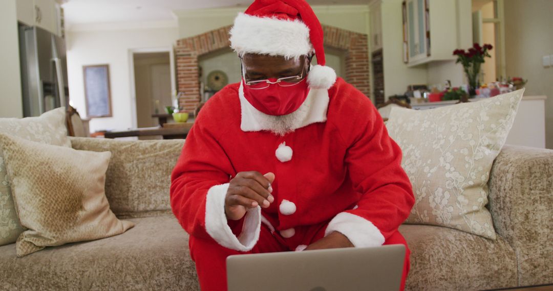 Virtual Santa Communicating Online from Home - Free Images, Stock Photos and Pictures on Pikwizard.com